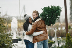 couple buying Christmas tree