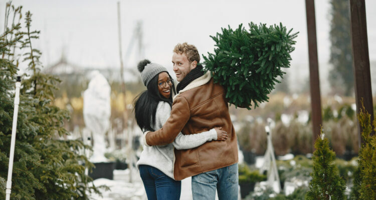 couple buying Christmas tree