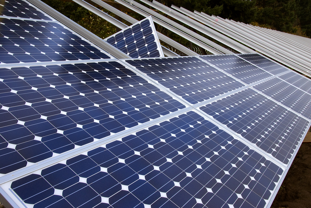 "Installing solar panels," Flickr photo credit: OregonDOT