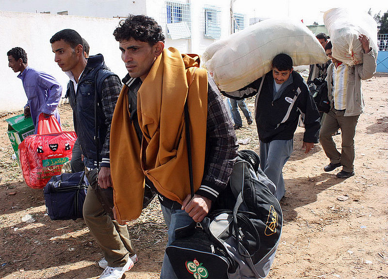 Libyan
refugees arrive at the Tunisia border (Image: Wikimedia) 