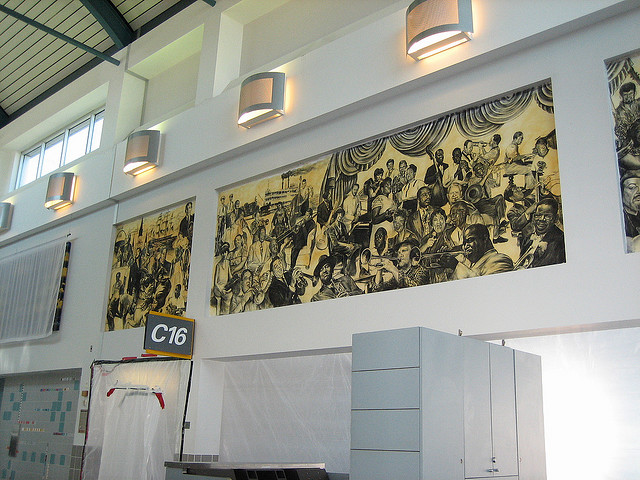 A mural  inside New Orleans Louis Armstrong International (Flickr: dlo 2008)