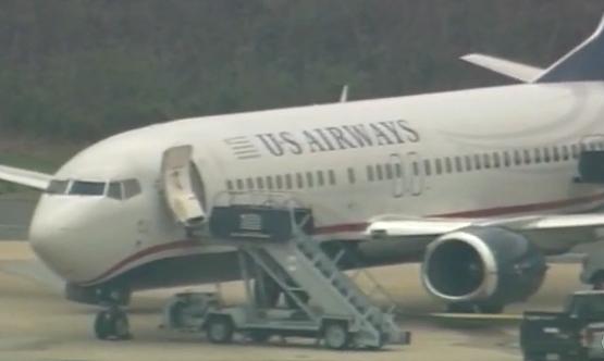 US Airways plane gets struck by bullet. (Image: CNN)