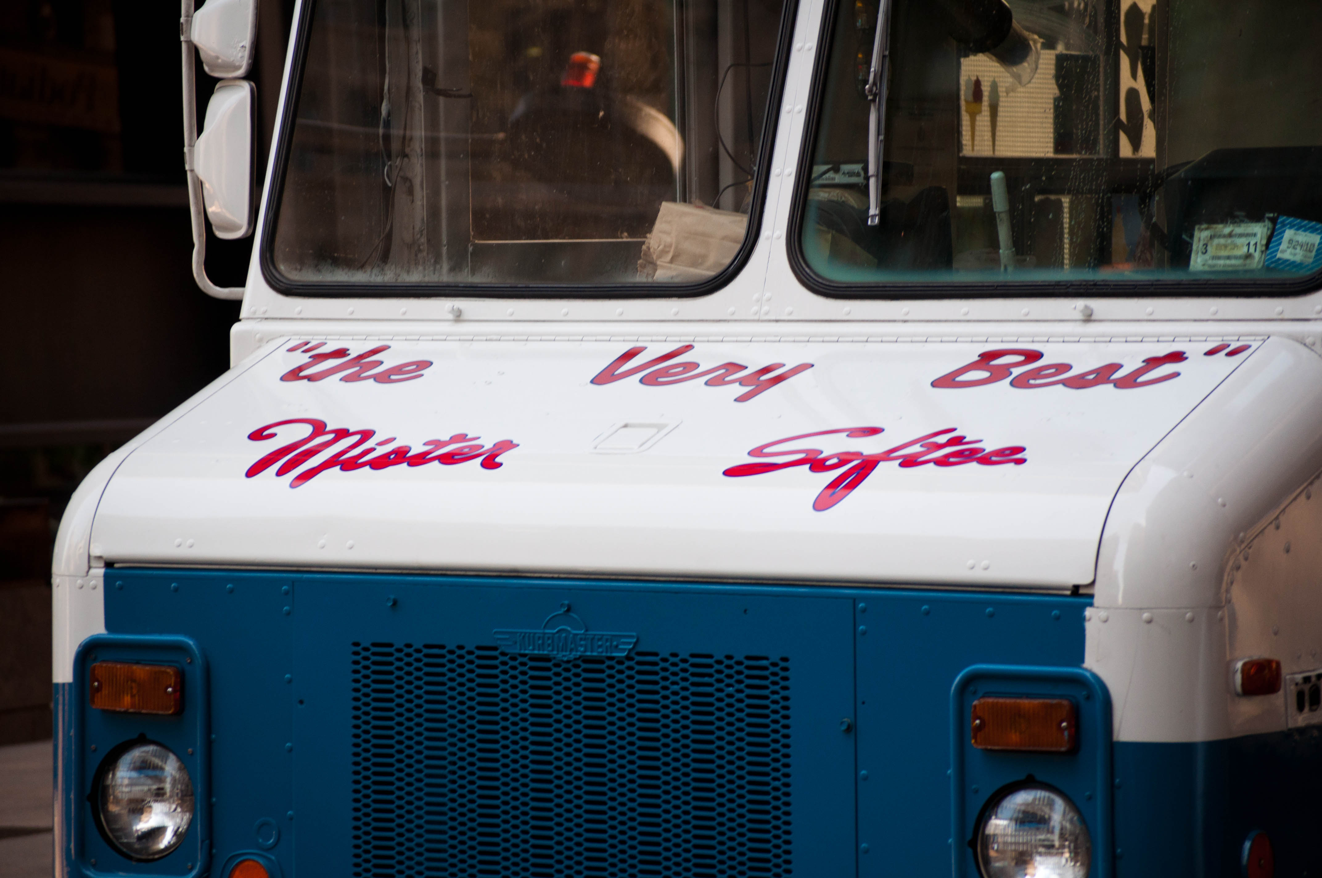 Mister Softee rolling down a NYC street in the summer. 