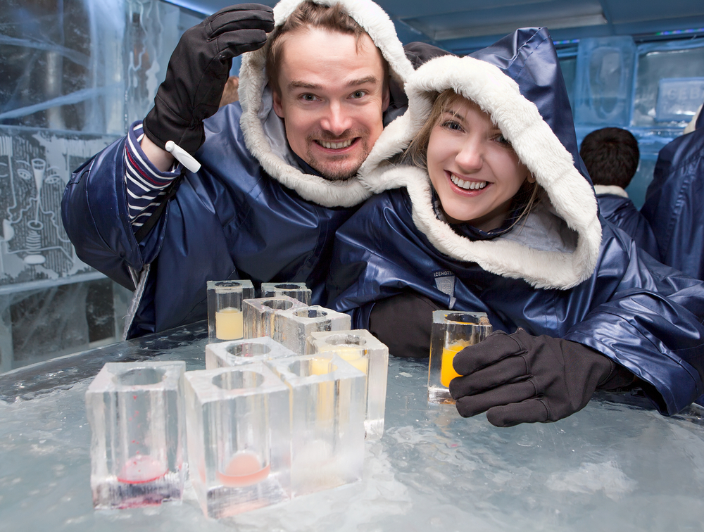 a couple at an ice bar 