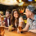 Young people having a drink at a table