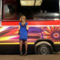 girls standing in front of food truck