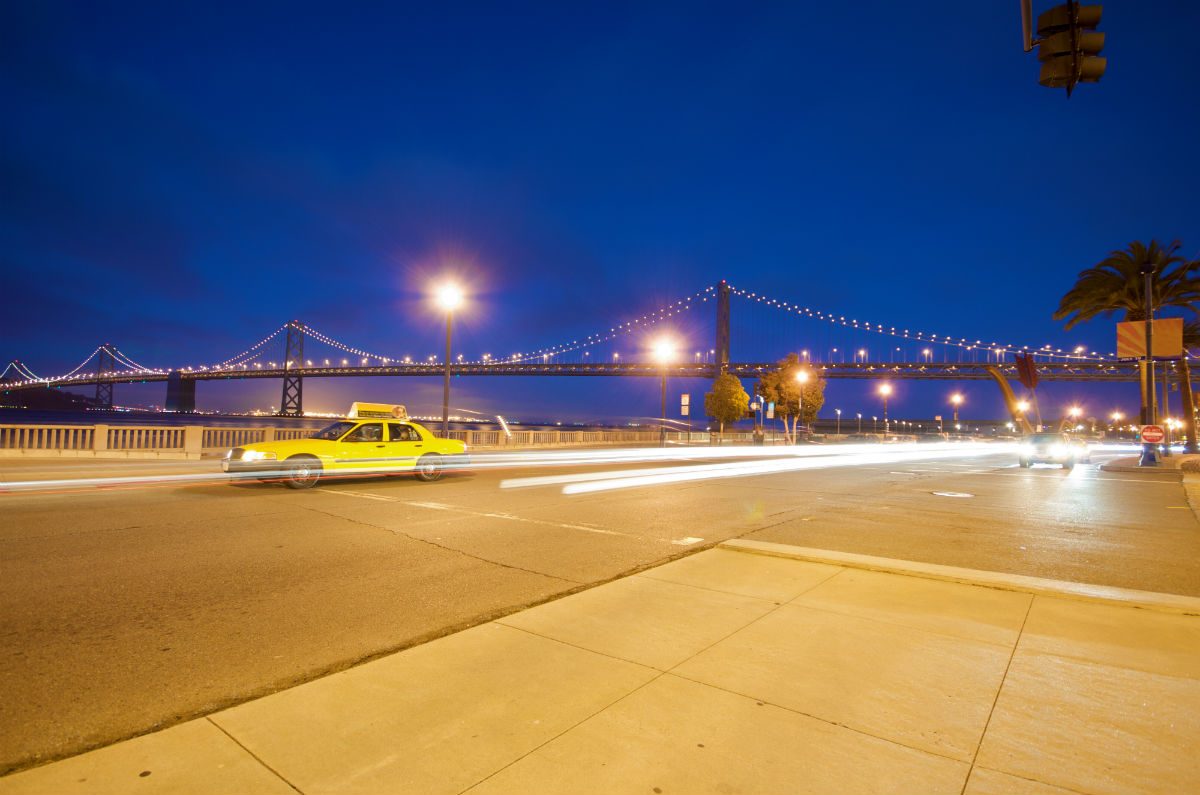 taxi with golden gate in background