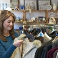 woman shopping in thrift store