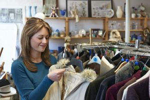 woman shopping in thrift store