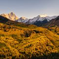 Fall foliage color and big mountain with snow on top. Capital Peak, Snowmass Wilderness, Colorado