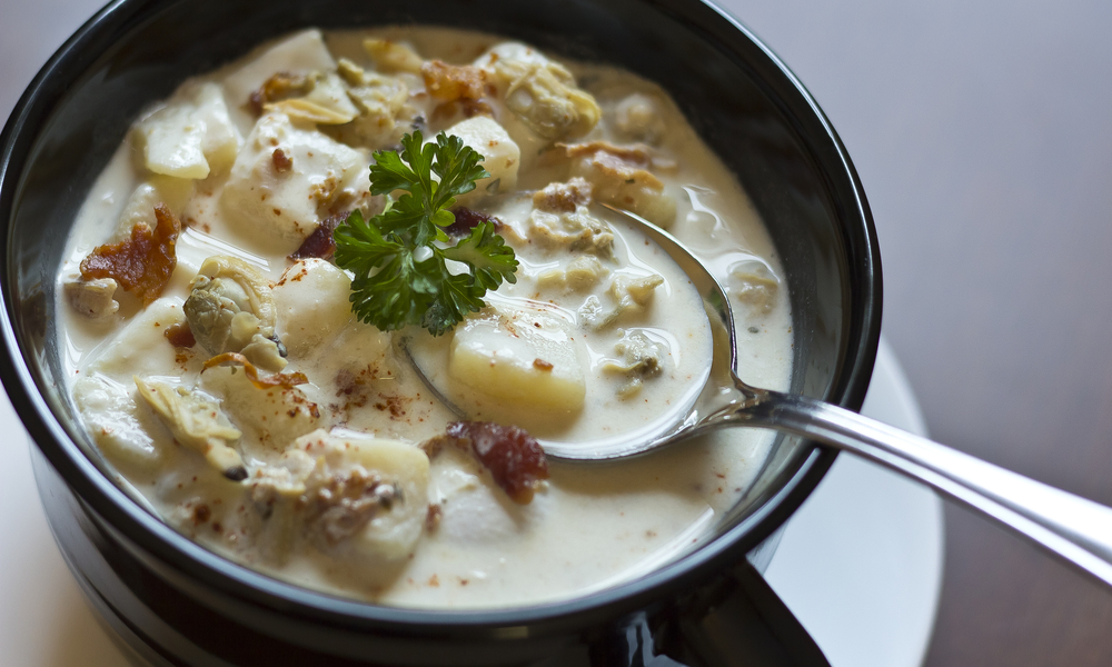 Creamy New England Clam Chowder garnished with parsley