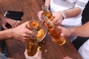 View on friends having alcoholic drinks in the bar