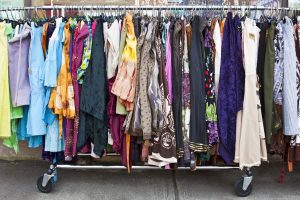 Rack of used womens dresses.